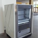 Thumbnail of http://Modular%20food%20kiosk%20at%20a%20convention%20center%20-%20view%20of%20refrigerator