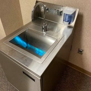 Hand sink with UV sanitation